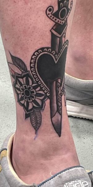 Traditional Symbol Tattoo Traditional tattoo artwork with bold black outlines