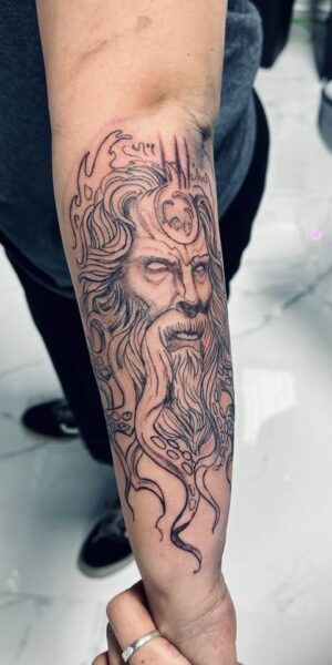 Portrait Style Tattoo Detailed portrait-style tattoo artwork on the arm