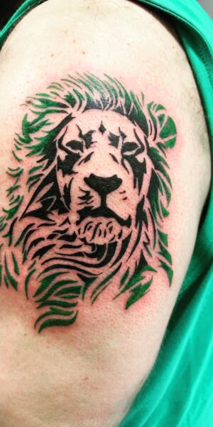 Lion Tattoo Artwork Lion tattoo design with bold linework and expressive details