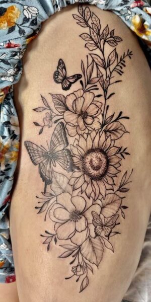 Butterfly Tattoo Design tattoo design featuring flowers, leaves and butterflies
