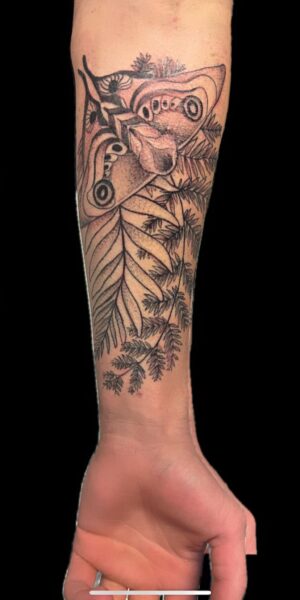 Nature-Inspired Tattoo Design Nature-inspired tattoo artwork with detailed line shading